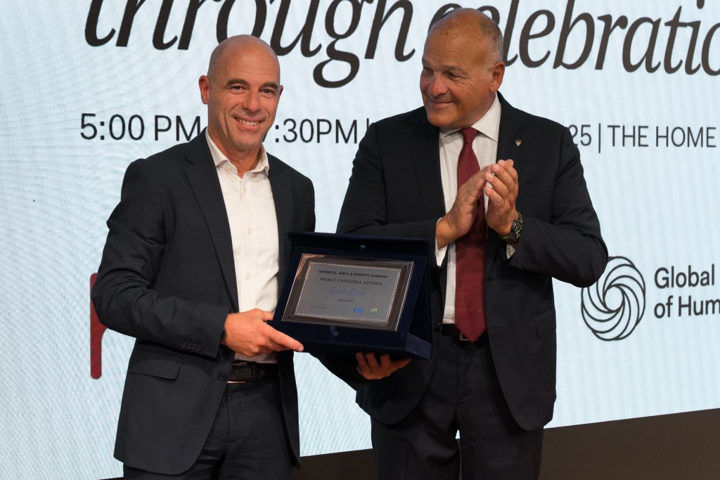 Guido Rizzo receiving the Sports, Arts and & Human Rights Award